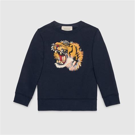 felpa gucci tigre blu|La nuova linea Gucci Tiger ispirata all’anno della tigre .